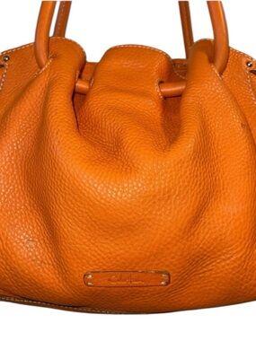 Cole Haan Orange Pebbled Leather Loop Shoulder Bag. Soft and Scrunchy! Vibrant.